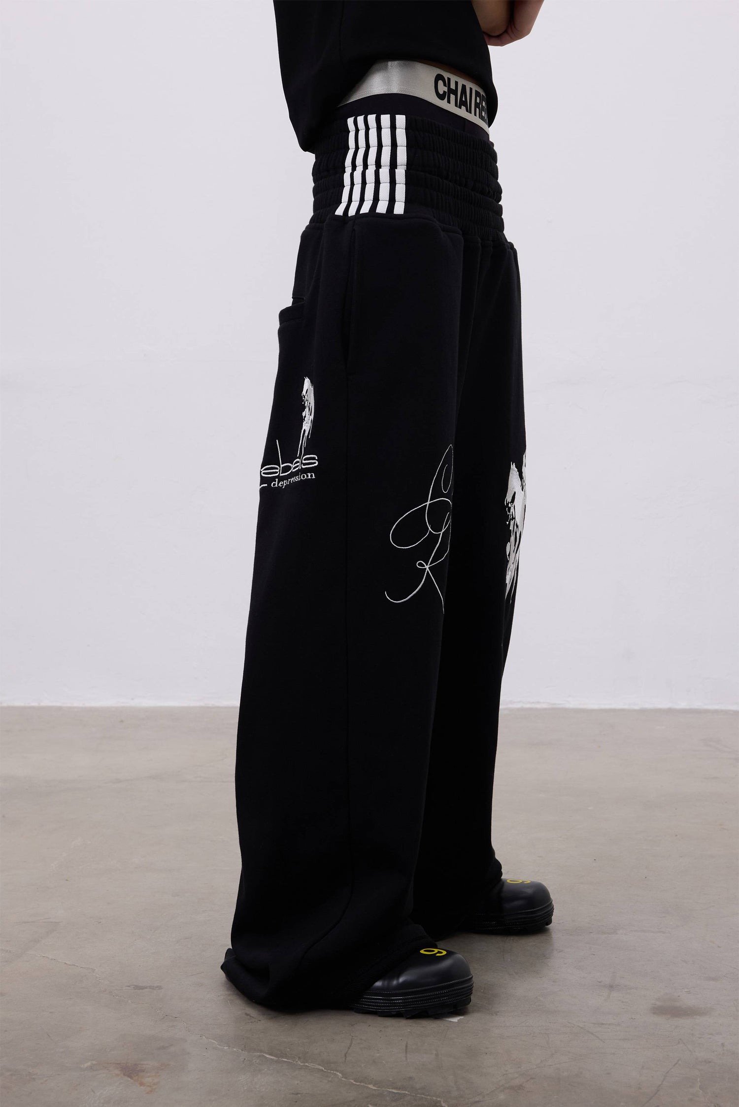 CHAI REBELS Embroidered Baggy Sweatpants